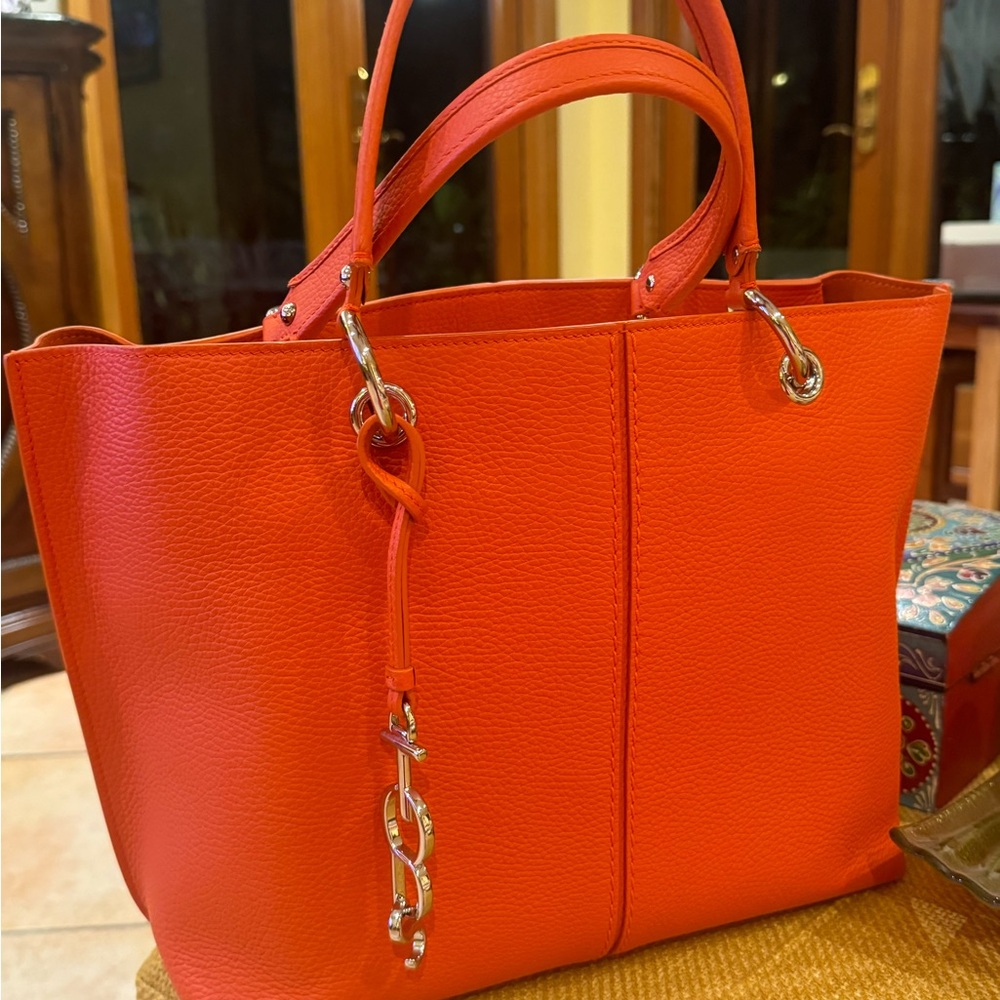 Tod’s Tote comes with strap to use as crossbody bag. New no tags